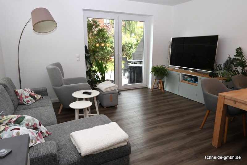 Schöne 3-Zimmer-Erdgeschoss-Wohnung mit Terrasse und Gartenanteil - Foto 1