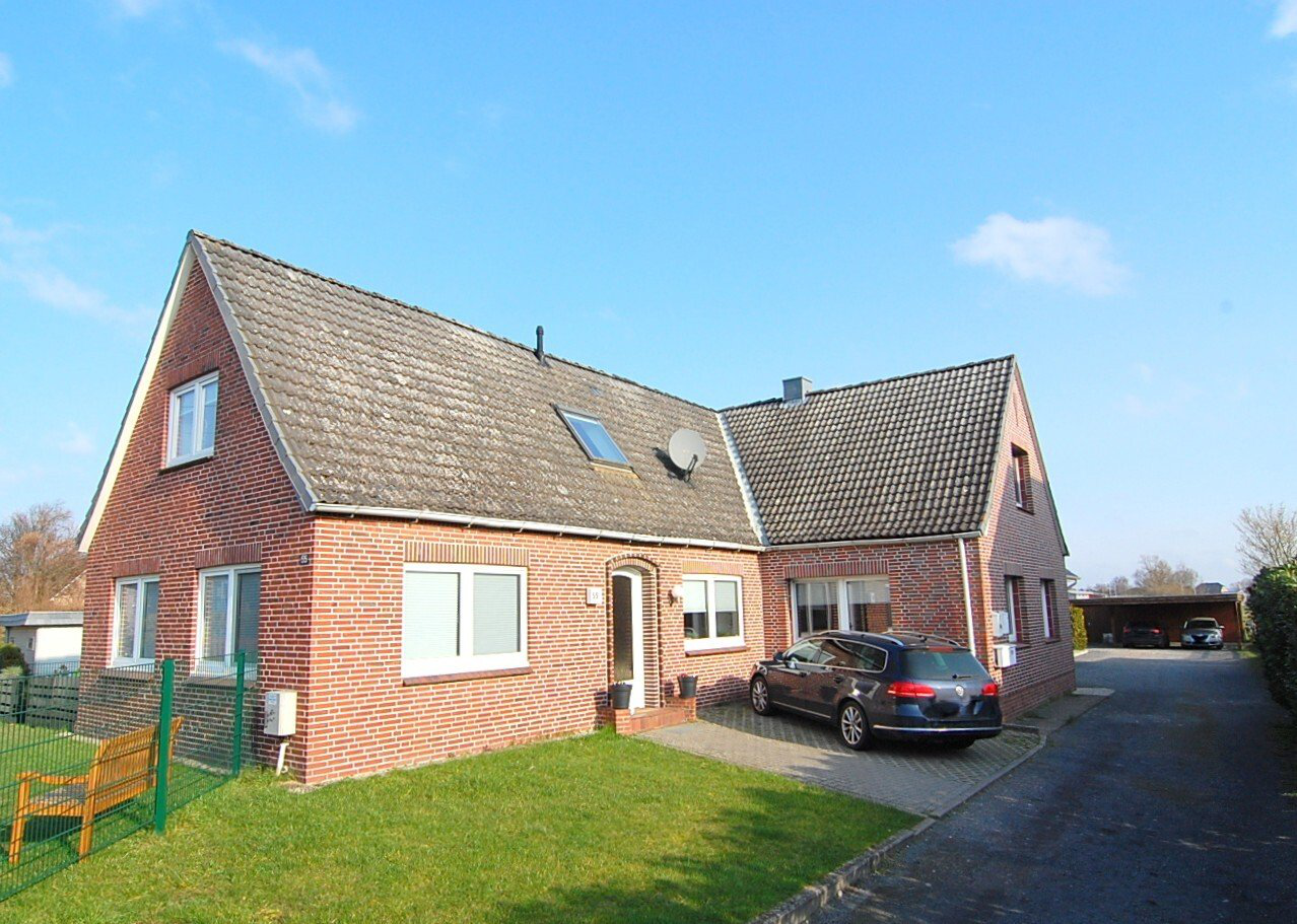 Geräumige 3‑Zimmer‑Wohnung im Erd- und Dachgeschoss eines Zweifamilienhauses - Foto 1